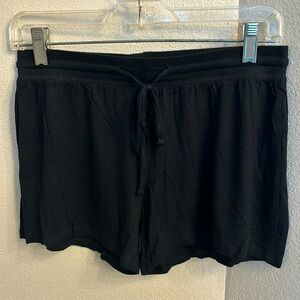 Black knit shorts.